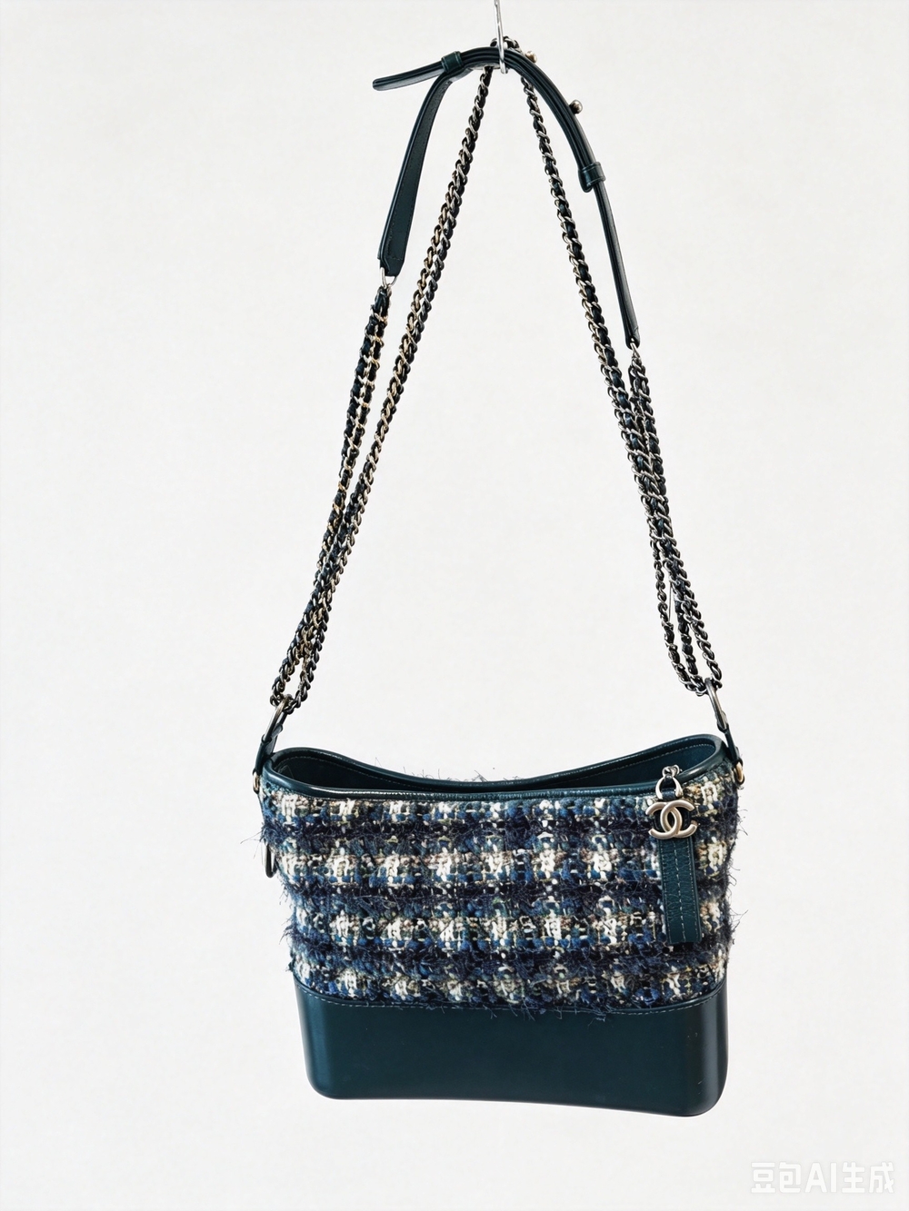 a Chanel Tweed Gabrielle Bag